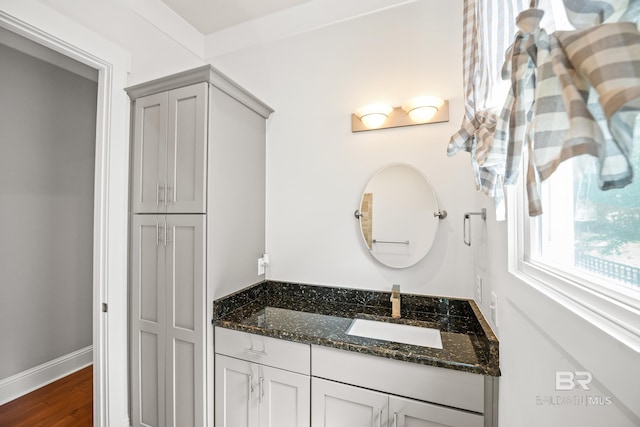 467 Colony Dr, Fairhope, AL 36532 - bathroom with wood finished floors, vanity, and baseboards