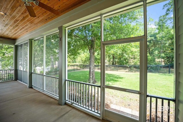 467 Colony Dr, Fairhope, AL 36532 - unfurnished sunroom with ceiling fan and view of scattered trees