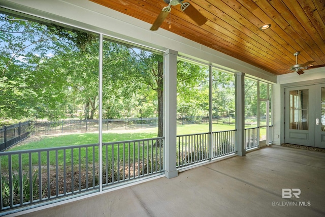 467 Colony Dr, Fairhope, AL 36532 - unfurnished sunroom featuring a ceiling fan and view of scattered trees