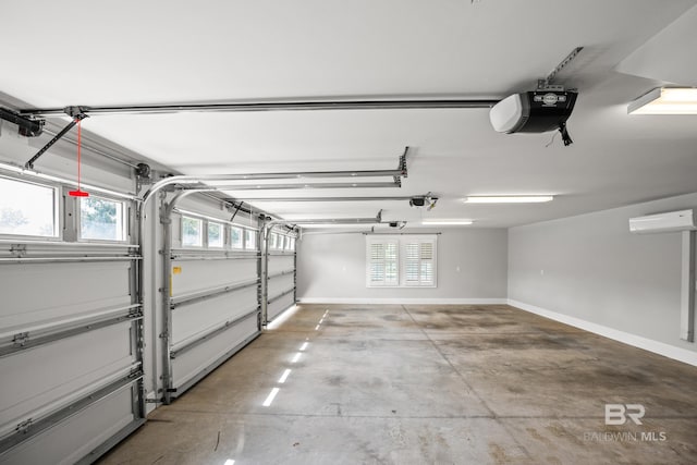 467 Colony Dr, Fairhope, AL 36532 - garage featuring a garage door opener and baseboards