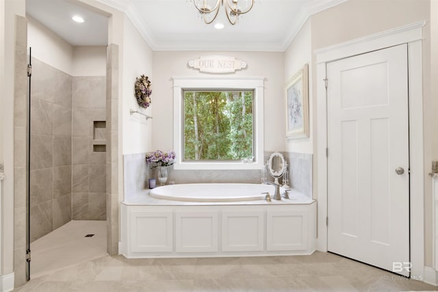 bathroom with crown molding, tiled shower, a bath, and a chandelier