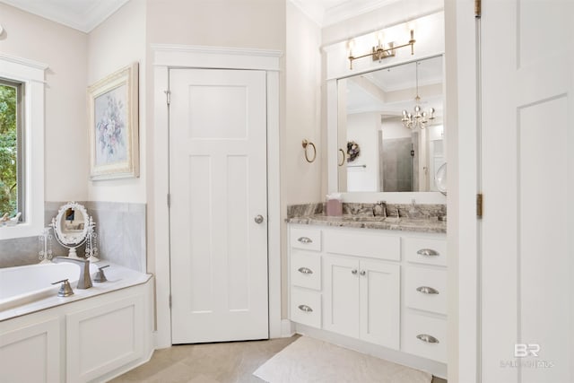 full bathroom featuring crown molding, a chandelier, a bath, and vanity