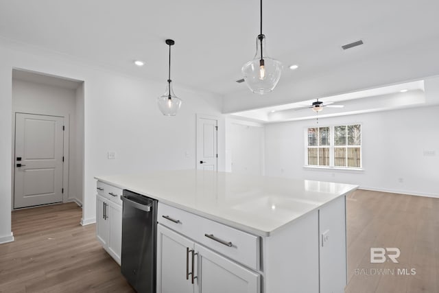 kitchen with visible vents, pendant lighting, recessed lighting, light wood-style flooring, and white cabinets