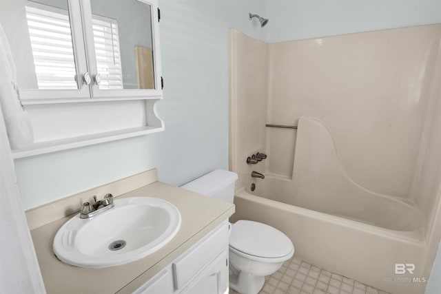 full bath featuring tub / shower combination, vanity, and toilet