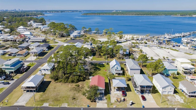 bird's eye view featuring a residential view and a water view