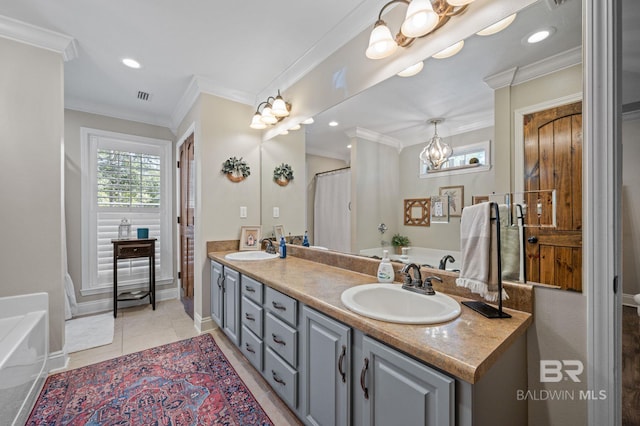 bathroom with tile patterned flooring, vanity, and crown molding