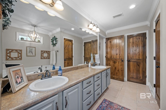 bathroom featuring tile patterned flooring, vanity, a chandelier, and ornamental molding