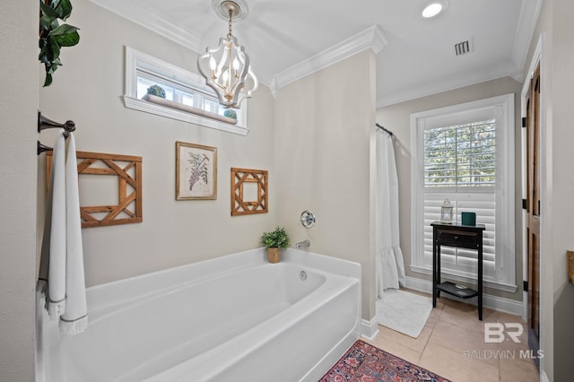 bathroom featuring a bathing tub, tile patterned flooring, a notable chandelier, and ornamental molding