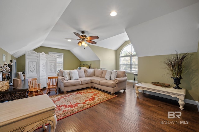 living room with dark hardwood / wood-style floors, vaulted ceiling, and ceiling fan