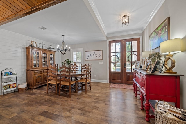 dining room with dark wood-type flooring, french doors, and a healthy amount of sunlight