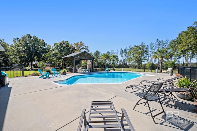 view of pool featuring a gazebo and a patio area