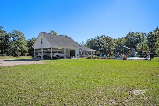 exterior space featuring a carport and a sunroom