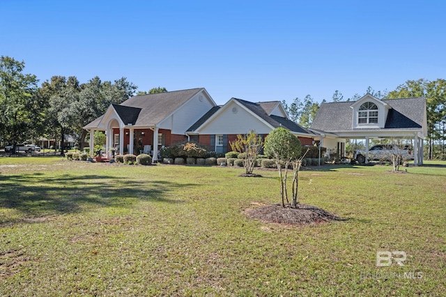 new england style home featuring a front lawn