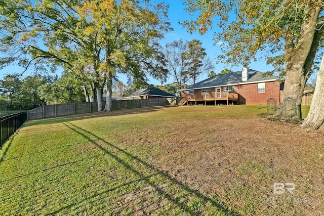 view of yard featuring a deck