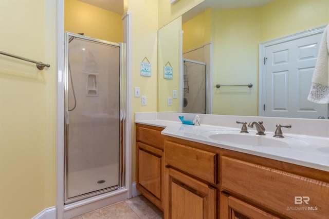 630 Lemoyne Dr Unit 8D, Dauphin Island, AL 36528 - bathroom featuring a shower stall, tile patterned floors, and vanity