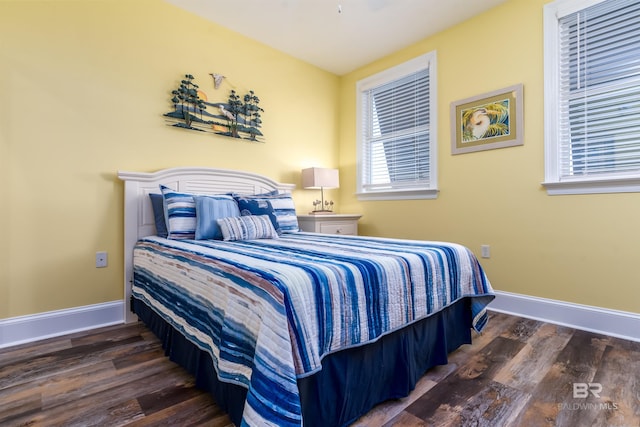 630 Lemoyne Dr Unit 8D, Dauphin Island, AL 36528 - bedroom with baseboards and wood finished floors