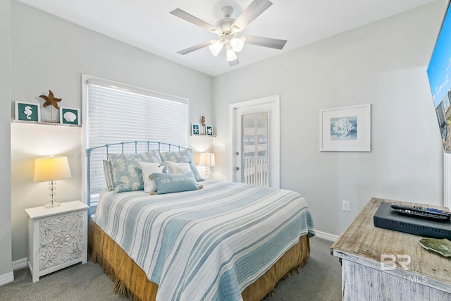 bedroom with ceiling fan and light colored carpet