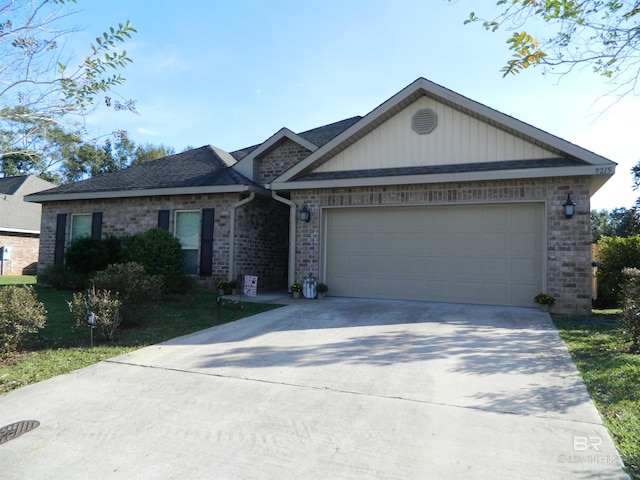 ranch-style home featuring a garage