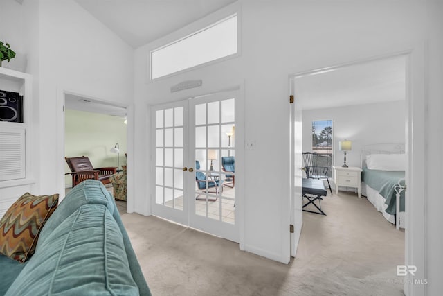 2277 Oyster Bay Ln Unit 502, Gulf Shores, AL 36542 - doorway with french doors, carpet floors, and a high ceiling