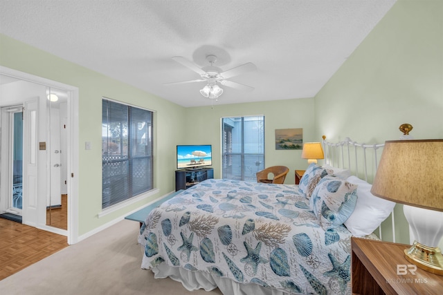 2277 Oyster Bay Ln Unit 502, Gulf Shores, AL 36542 - bedroom with baseboards and a ceiling fan