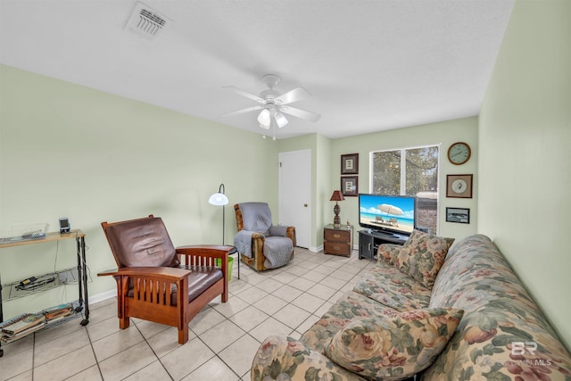 2277 Oyster Bay Ln Unit 502, Gulf Shores, AL 36542 - living area with ceiling fan, baseboards, tile patterned flooring, and visible vents