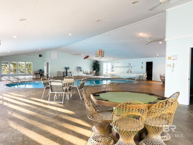 2277 Oyster Bay Ln Unit 502, Gulf Shores, AL 36542 - dining room with concrete floors, ceiling fan, plenty of natural light, and vaulted ceiling