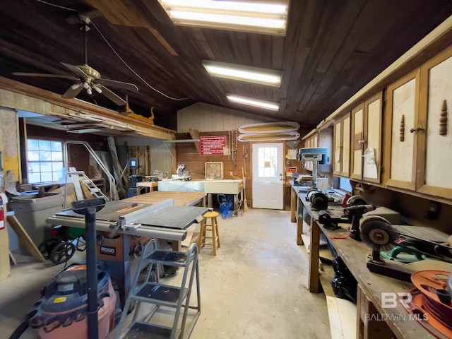 2277 Oyster Bay Ln Unit 502, Gulf Shores, AL 36542 - interior space featuring a wealth of natural light, a workshop area, concrete flooring, and lofted ceiling