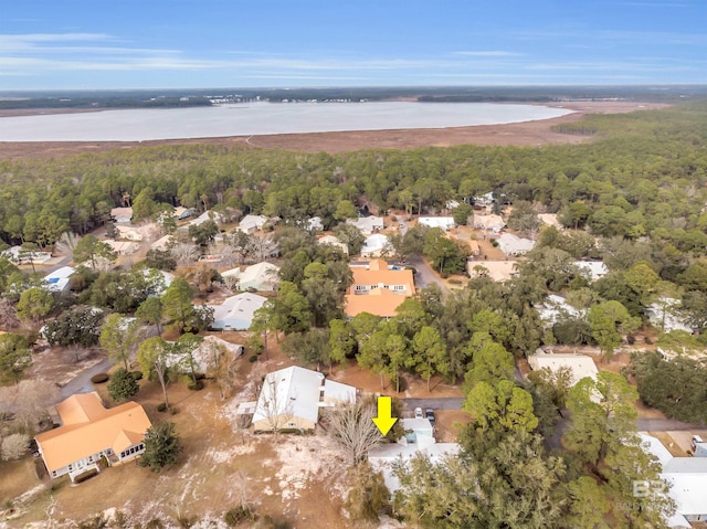 2277 Oyster Bay Ln Unit 502, Gulf Shores, AL 36542 - drone / aerial view with a water view, a residential view, and a forest view