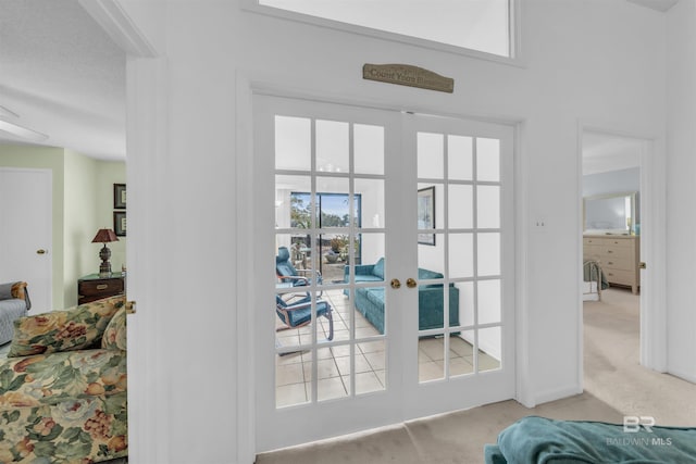 2277 Oyster Bay Ln Unit 502, Gulf Shores, AL 36542 - doorway with french doors and carpet floors