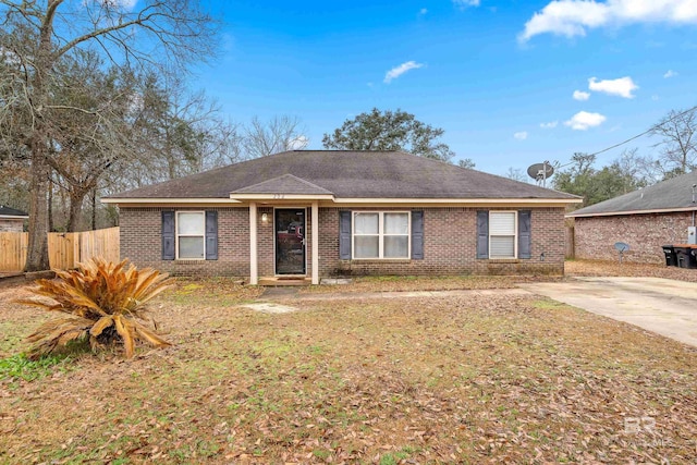 ranch-style house with a front yard