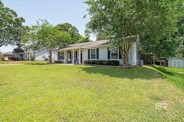 9340 Burnt Tree Dr, Mobile, AL 36695 - ranch-style home featuring a front yard, covered porch, and central air condition unit