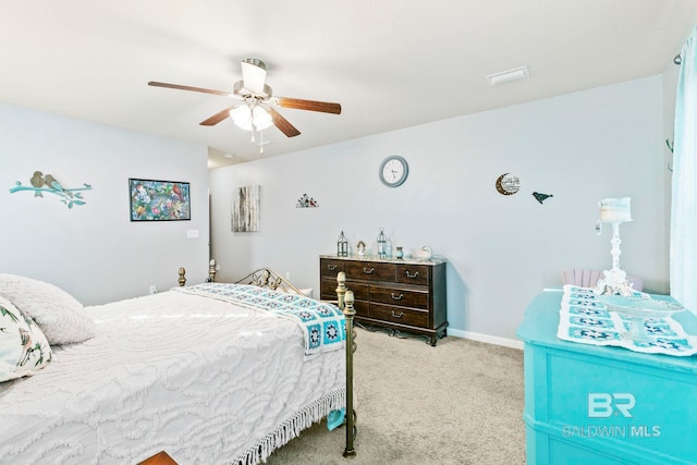 bedroom featuring light colored carpet and ceiling fan