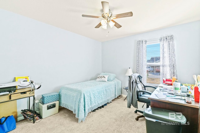 bedroom featuring light colored carpet and ceiling fan