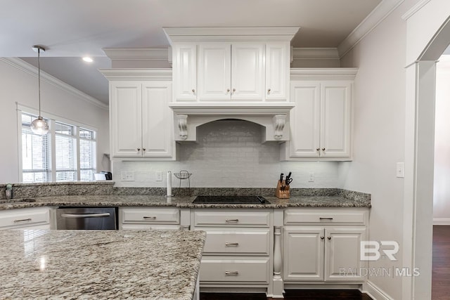 kitchen featuring light stone counters, white cabinetry, and black electric cooktop