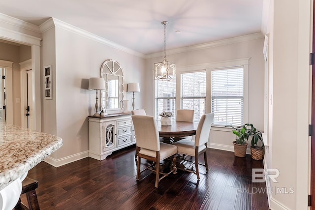 dining space featuring dark hardwood / wood-style flooring and crown molding