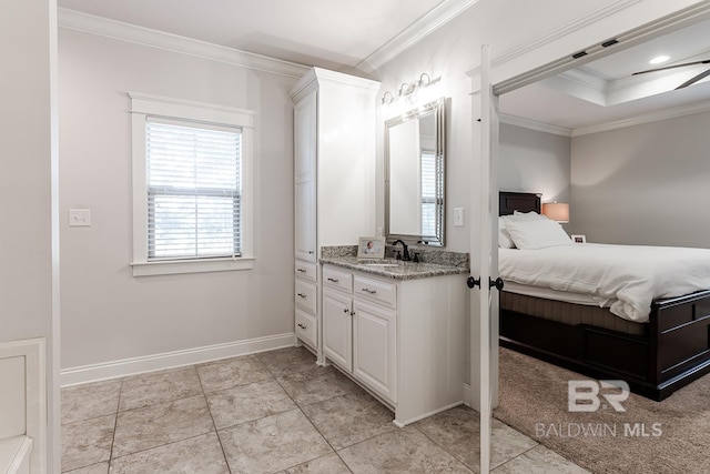 bathroom with tile patterned flooring, ceiling fan, crown molding, and vanity