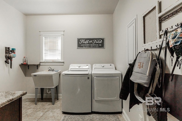 washroom with washer and clothes dryer