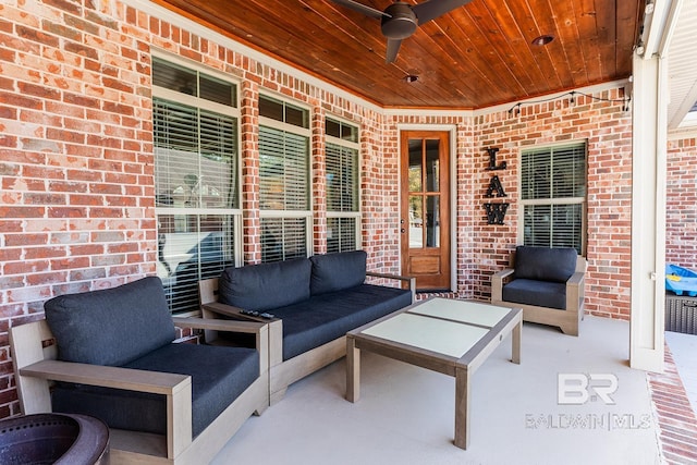 view of patio featuring an outdoor living space and ceiling fan