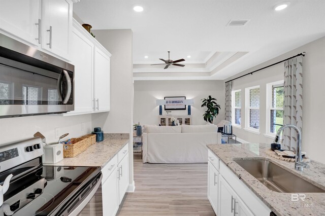 12753 Shoshoney Cir, Fairhope, AL 36532 - kitchen featuring a sink, white cabinetry, recessed lighting, appliances with stainless steel finishes, and ceiling fan