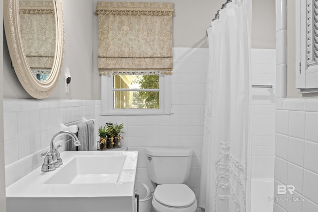 full bathroom featuring tile walls, sink, shower / bath combo, and toilet