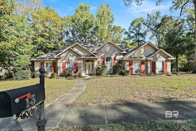 13 Bugle Retreat, Spanish Fort, AL 36527 - view of front of house with a front lawn and brick siding