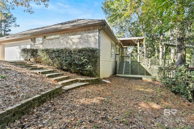 view of property exterior featuring a garage