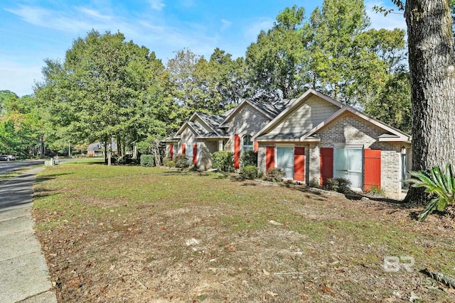 13 Bugle Retreat, Spanish Fort, AL 36527 - view of front of home with brick siding and a front lawn