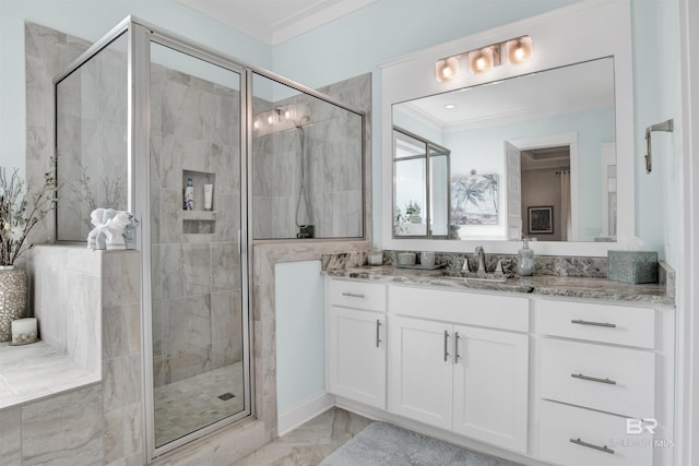 full bathroom with ornamental molding, marble finish floor, vanity, and a shower stall