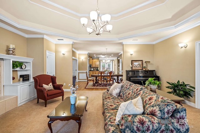 living room featuring a raised ceiling, crown molding, light carpet, and a notable chandelier