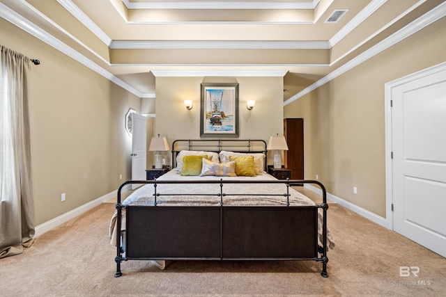 bedroom featuring a tray ceiling, crown molding, and light colored carpet