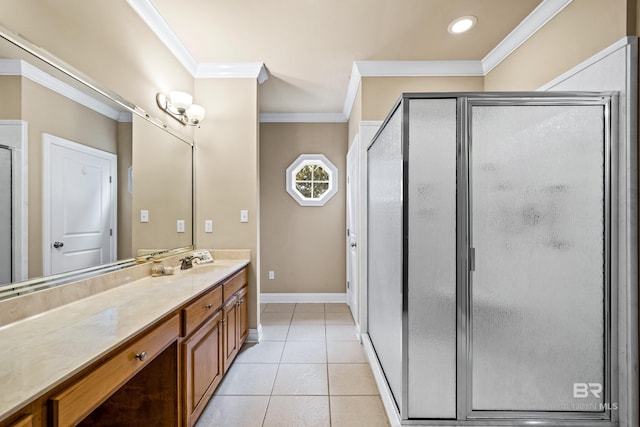 bathroom featuring crown molding, tile patterned floors, a shower with shower door, and vanity