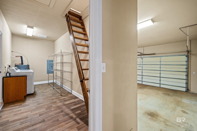 garage with separate washer and dryer