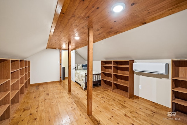 bonus room with wood ceiling, lofted ceiling, hardwood / wood-style floors, and a wall unit AC