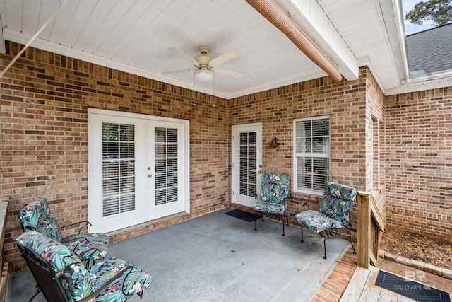 view of patio / terrace with an outdoor living space, french doors, and ceiling fan